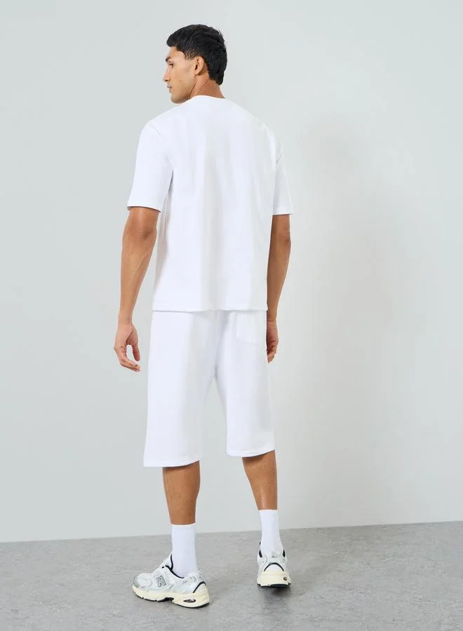 Styli  Men White Graphic Print T-Shirt and Shorts Co-Ords for Men | Best Price UAE